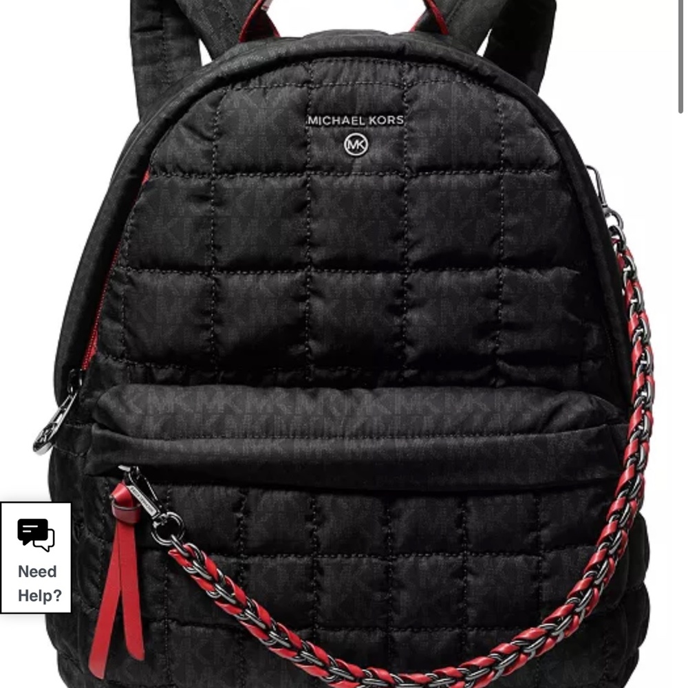 Michael Kors medium backpack. The backpack is quilted and light to wear.